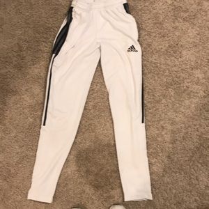 All White adidas pants with black stripes